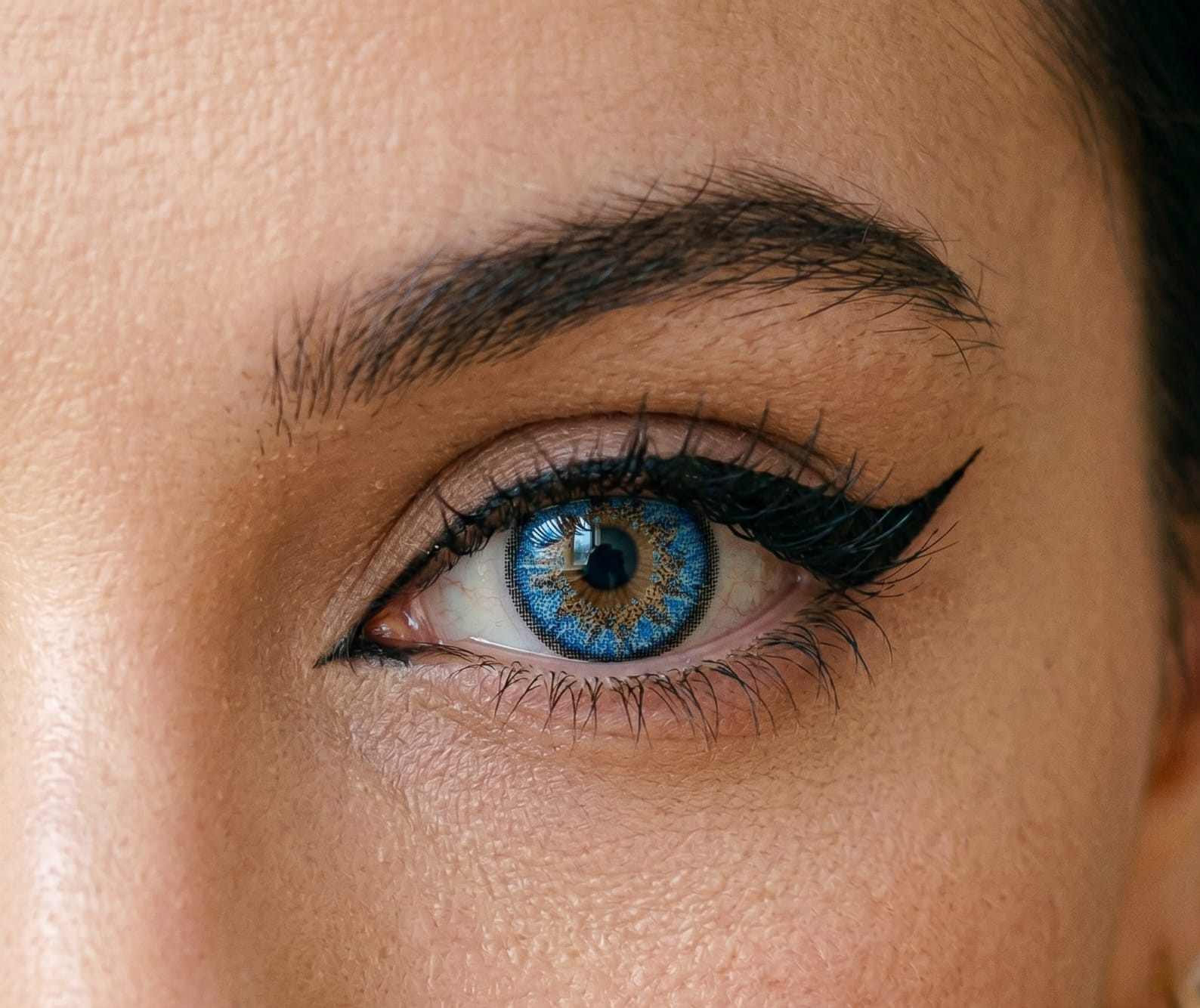 Aqua Blue contact lens close-up eye shot